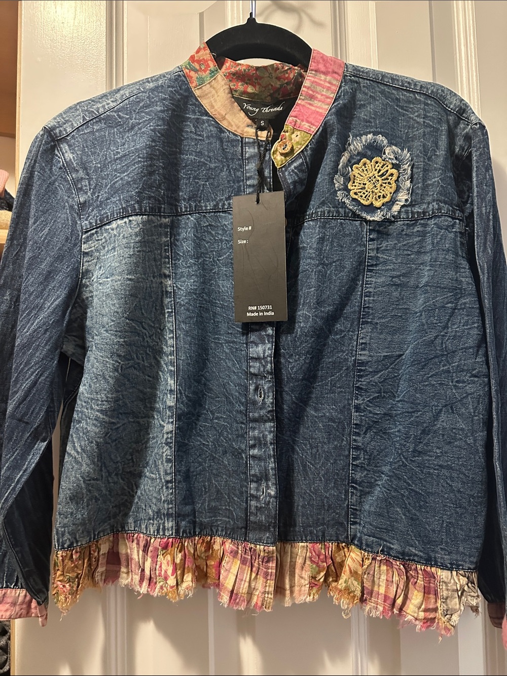 Women's Blue Denim Jacket with Floral Trim by Nancy Andrade